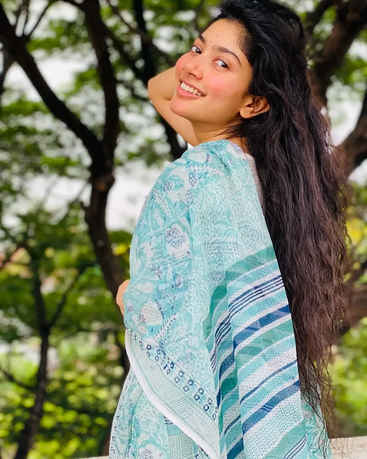 Indian Actress Sai Pallavi Smiling Face in Sleeveless Blue Saree